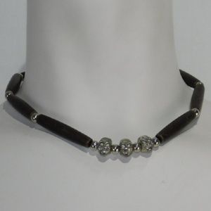Multi-media Links Silvertone Skull Necklace.